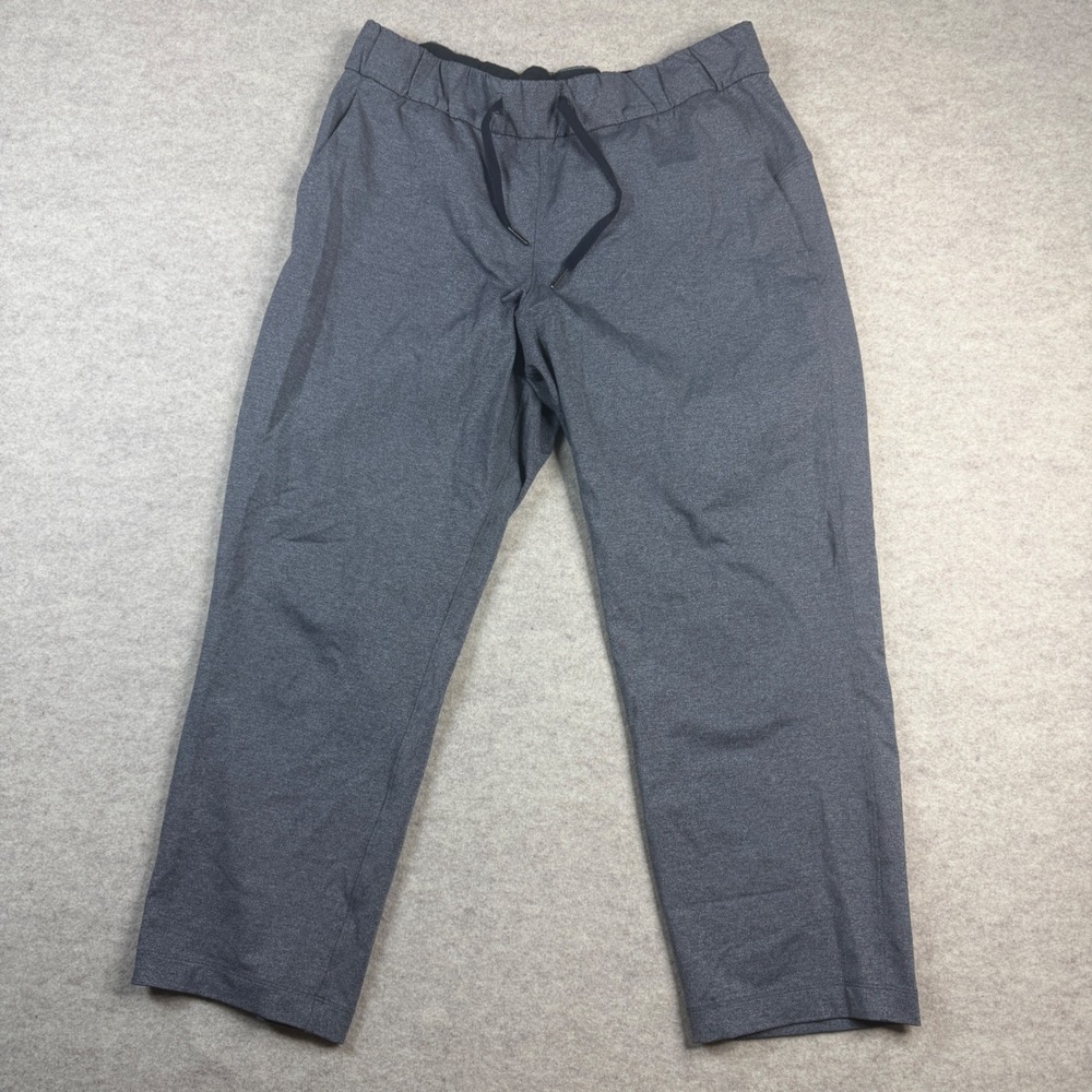 Lululemon On the Fly Crop Pant 8 Heathered Grey Drawstring Athletic Trousers